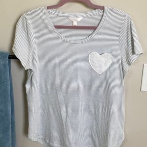 Lauren Conrad blue and white striped t shirt with white eyelet heart pocket.